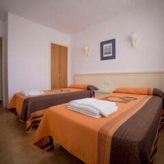 Отель Eldorado Apartamentos Turisticos Испания, Льорет-де-Мар - отзывы, цены и фото номеров - забронировать отель Eldorado Apartamentos Turisticos онлайн комната для гостей