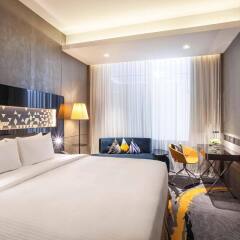 Отель Novotel Singapore on Stevens комната для гостей фото 4