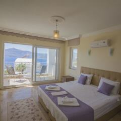 Villa Baysal 2 by Akdenizvillam Турция, Патара - отзывы, цены и фото номеров - забронировать отель Villa Baysal 2 by Akdenizvillam онлайн комната для гостей фото 4