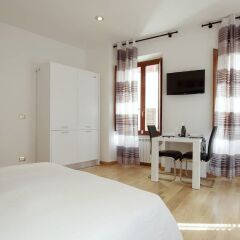 Отель Central Rome Suites комната для гостей