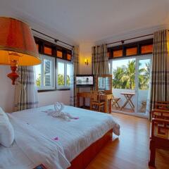 Aurora Riverside Hotel & Villas Hoi An в номере