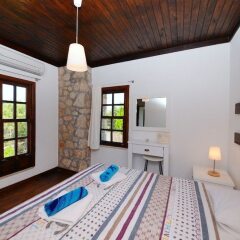 Villa Sedir by Akdenizvillam Турция, Патара - отзывы, цены и фото номеров - забронировать отель Villa Sedir by Akdenizvillam онлайн сейф в номере