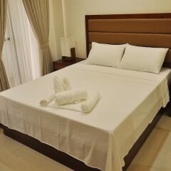 Отель Rishan Village Residences Филиппины, Пампанга - отзывы, цены и фото номеров - забронировать отель Rishan Village Residences онлайн комната для гостей фото 2