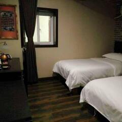 Dongfang Shengda Cultural Hotel (Nanluoguxiang, Houhai) комната для гостей фото 2