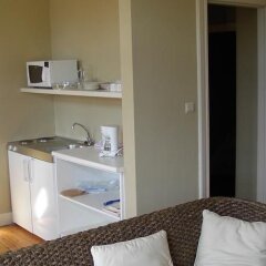 Отель FLATS - Residence D'ici D'ailleurs Бельгия, Брюссель - отзывы, цены и фото номеров - забронировать отель FLATS - Residence D'ici D'ailleurs онлайн удобства в номере фото 2