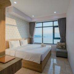 Апартаменты Handy Beachfront Apartment Нячанг комната для гостей фото 4