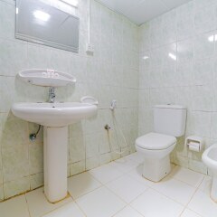 Отель Dana Al Buhairah Hotel ОАЭ, Шарджа - отзывы, цены и фото номеров - забронировать отель Dana Al Buhairah Hotel онлайн ванная