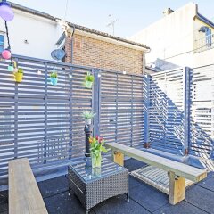 Отель Brighton Getaways - Sunny Cottage спортивное сооружение