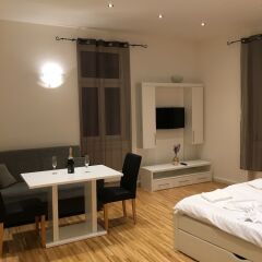 Отель United Homes Apartments Vienna Австрия, Вена - отзывы, цены и фото номеров - забронировать отель United Homes Apartments Vienna онлайн гостиничный бар