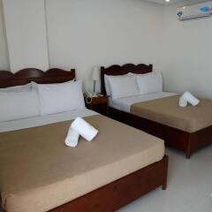 Отель Ipil Suites Puerto Princesa Филиппины, Пуэрто-Принцеса - отзывы, цены и фото номеров - забронировать отель Ipil Suites Puerto Princesa онлайн удобства в номере фото 2