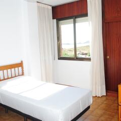 Отель Apartamentos Turisticos Suaces Испания, Ноха - отзывы, цены и фото номеров - забронировать отель Apartamentos Turisticos Suaces онлайн комната для гостей фото 5