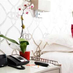 Room Mate Grace Boutique Hotel в номере фото 2
