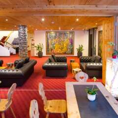 Отель Sport & Wellness Hotel San Gian St Moritz Швейцария, Санкт-Мориц - отзывы, цены и фото номеров - забронировать отель Sport & Wellness Hotel San Gian St Moritz онлайн интерьер отеля