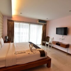 Апартаменты Kaewfathip Apartment Паттайя комната для гостей фото 3