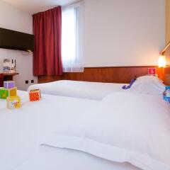 Brit Hotel Rennes St Grégoire - Le Villeneuve сейф в номере