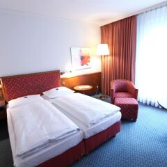 Seminaris Hotel Leipzig Лейпциг комната для гостей