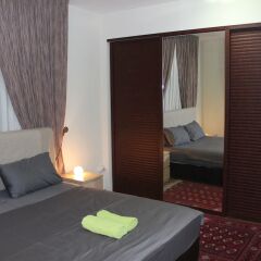 Отель Beautiful 2 BR Apt Quiet & Private Иордания, Амман - отзывы, цены и фото номеров - забронировать отель Beautiful 2 BR Apt Quiet & Private онлайн комната для гостей фото 5