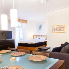 Отель ApartDirect Skeppsbron Швеция, Стокгольм - отзывы, цены и фото номеров - забронировать отель ApartDirect Skeppsbron онлайн комната для гостей