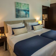 First Central Hotel Suites комната для гостей фото 3
