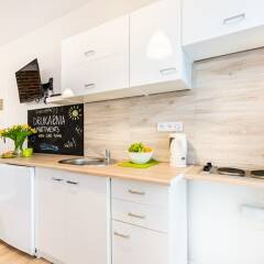 Апартаменты Drukarnia Apartments в номере