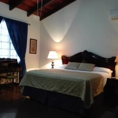 Отель Casa Colonial Bed And Breakfast Гондурас, Сан-Педро-Сула - отзывы, цены и фото номеров - забронировать отель Casa Colonial Bed And Breakfast онлайн комната для гостей фото 2