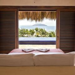 Отель Las Palmas Beachfront Villas Мексика, Коакоюл - отзывы, цены и фото номеров - забронировать отель Las Palmas Beachfront Villas онлайн комната для гостей фото 2