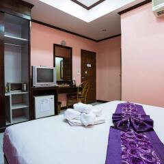 Отель The Grand Orchid Inn удобства в номере фото 2