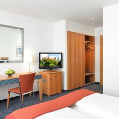 Отель Ringhotel Loews Merkur Германия, Нюрнберг - отзывы, цены и фото номеров - забронировать отель Ringhotel Loews Merkur онлайн удобства в номере