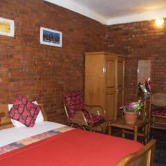 Отель Joy Family Lodge комната для гостей