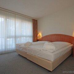 Отель Central Swiss Quality Sporthotel Швейцария, Давос - отзывы, цены и фото номеров - забронировать отель Central Swiss Quality Sporthotel онлайн комната для гостей фото 2