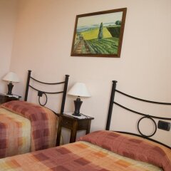 Отель B&B La Gibiana Костиглиоле-д'Асти сейф в номере