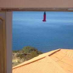 Отель Titicaca Lodge - Isla Amantani Перу, Тилилака - отзывы, цены и фото номеров - забронировать отель Titicaca Lodge - Isla Amantani онлайн пляж