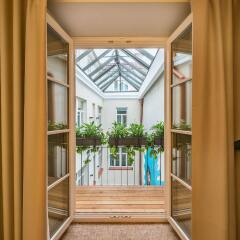 Отель Artagonist Art Hotel Литва, Вильнюс - 1 отзыв об отеле, цены и фото номеров - забронировать отель Artagonist Art Hotel онлайн интерьер отеля