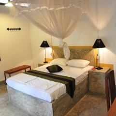Отель Waters Edge Bungalow комната для гостей