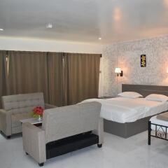 Апартаменты Galaxy Hotels & Apartments комната для гостей фото 2