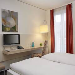 Отель H+ Hotel München Германия, Мюнхен - отзывы, цены и фото номеров - забронировать отель H+ Hotel München онлайн комната для гостей фото 4