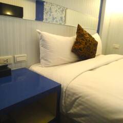 Lio Hotel Ximen комната для гостей