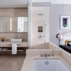 Отель The Ritz-Carlton, Hotel de la Paix, Geneva Швейцария, Женева - отзывы, цены и фото номеров - забронировать отель The Ritz-Carlton, Hotel de la Paix, Geneva онлайн ванная фото 2
