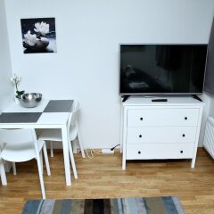Отель Kotimaailma Apts Joensuu Koulukatu 21 Йоенсуу комната для гостей