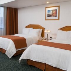 Отель Holiday Inn Dali Airport Мехико комната для гостей фото 4