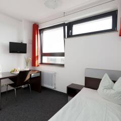 Отель DJH City-Hostel Köln-Riehl Германия, Кёльн - отзывы, цены и фото номеров - забронировать отель DJH City-Hostel Köln-Riehl онлайн комната для гостей фото 4