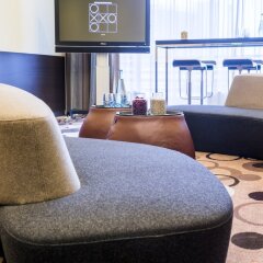Отель Radisson Blu Hamburg Airport Гамбург сейф в номере