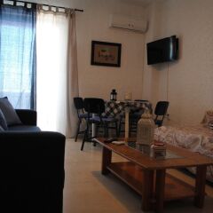 Апартаменты Andromachi Apartments комната для гостей фото 5