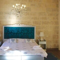 Отель Luciano Al Porto Boutique Accommodation Валетта комната для гостей фото 2