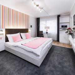 Отель Concept Living Munich Serviced Apartments Германия, Мюнхен - 1 отзыв об отеле, цены и фото номеров - забронировать отель Concept Living Munich Serviced Apartments онлайн комната для гостей