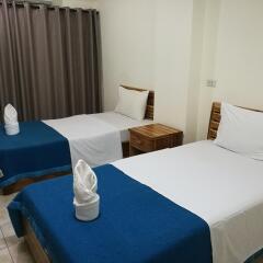 Апартаменты Soi 5 Apartment Паттайя комната для гостей