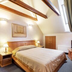 Апартаменты Atrium Suites комната для гостей фото 2