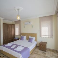 Villa Baysal 1 by Akdenizvillam Турция, Патара - отзывы, цены и фото номеров - забронировать отель Villa Baysal 1 by Akdenizvillam онлайн комната для гостей фото 4