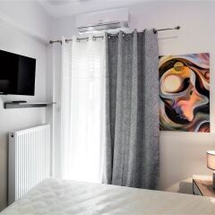 Отель Rigas Luxury Flat White Tower Греция, Салоники - отзывы, цены и фото номеров - забронировать отель Rigas Luxury Flat White Tower онлайн комната для гостей фото 4