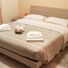 Отель Isola Verde Guest House Италия, Фьюмичино - отзывы, цены и фото номеров - забронировать отель Isola Verde Guest House онлайн комната для гостей фото 4